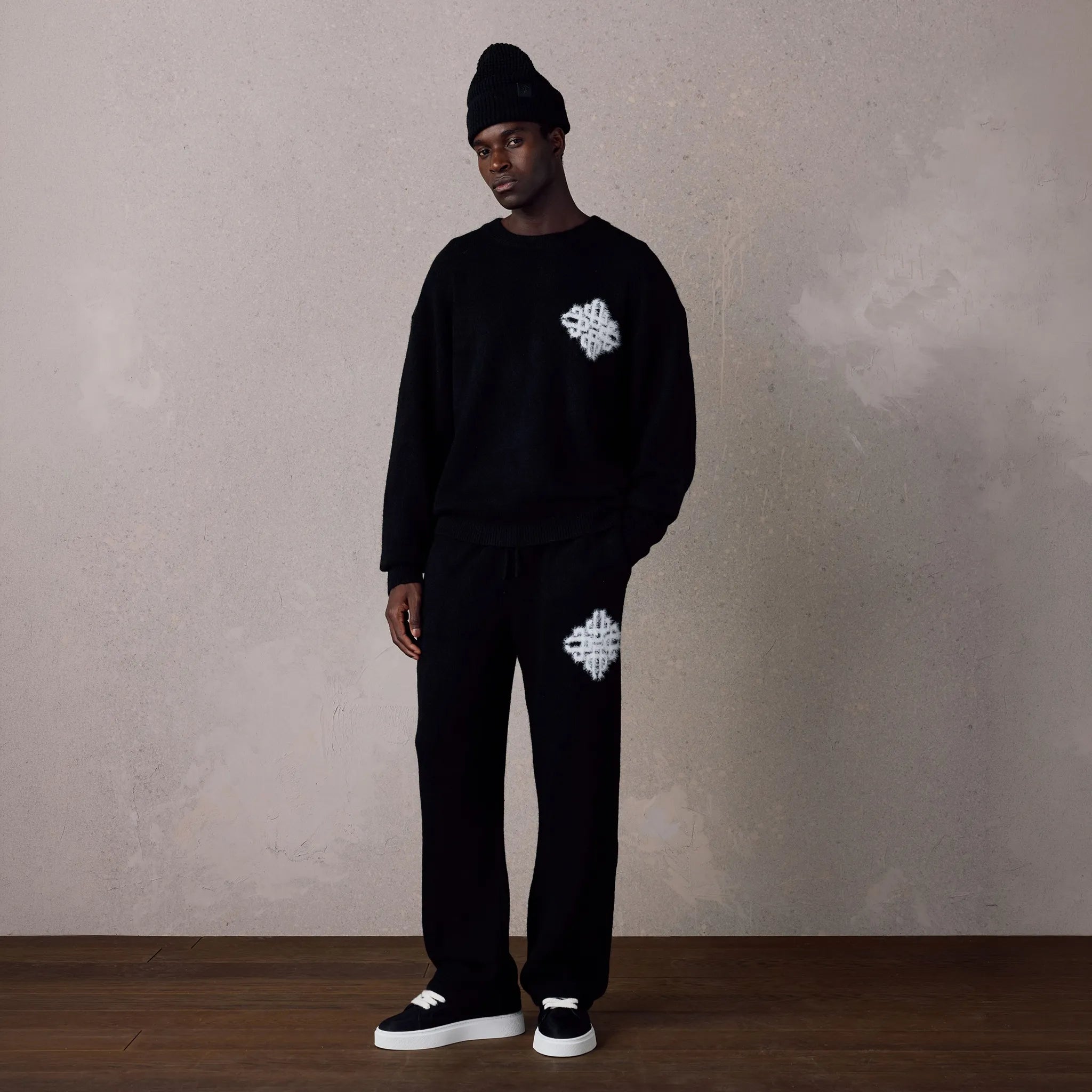 Front View of The Couture Club Emblem Fluffy Knit Black Sweatshirt